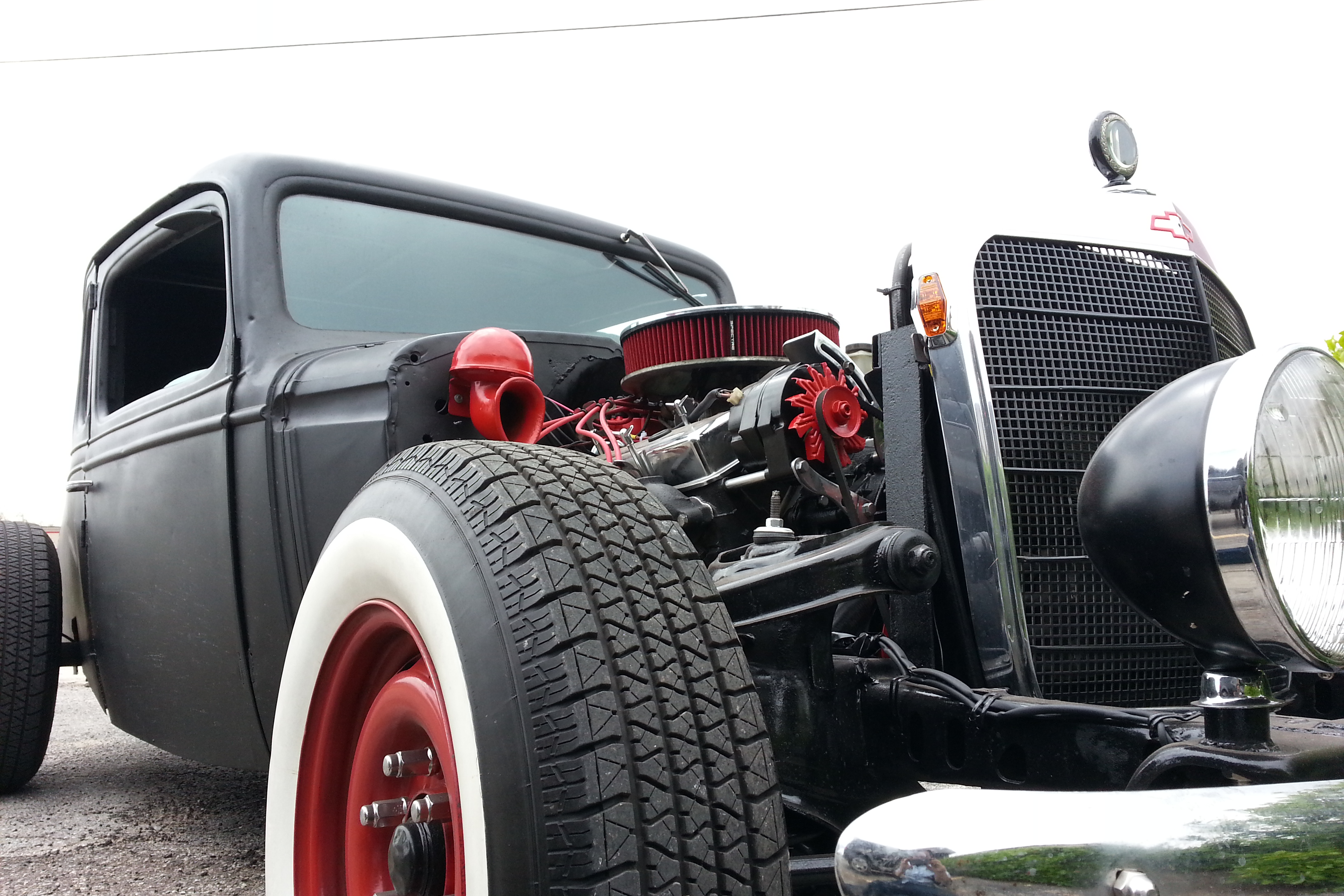 This was a custom ratrod that we built an exhaust system that went up through what would normally be the rear deck lid (usually called the trunk lid).