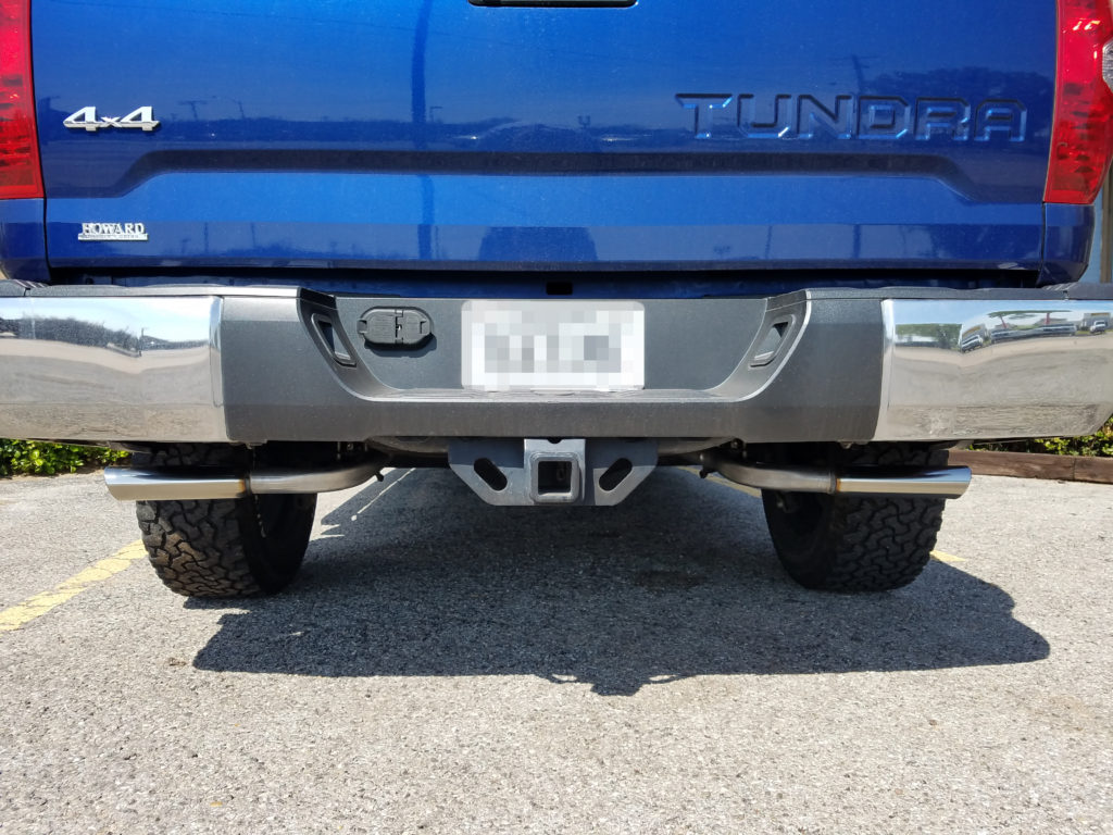 2015 Toyota Tundra that the customer requested true dual exhaust with the tail pipes exiting behind the rear tires, one on each side of the truck with stainless steel exhaust tips. We always suggest stainless steel exhaust tips when having the exhaust system exit behind the rear tires as they get more wear in that location.