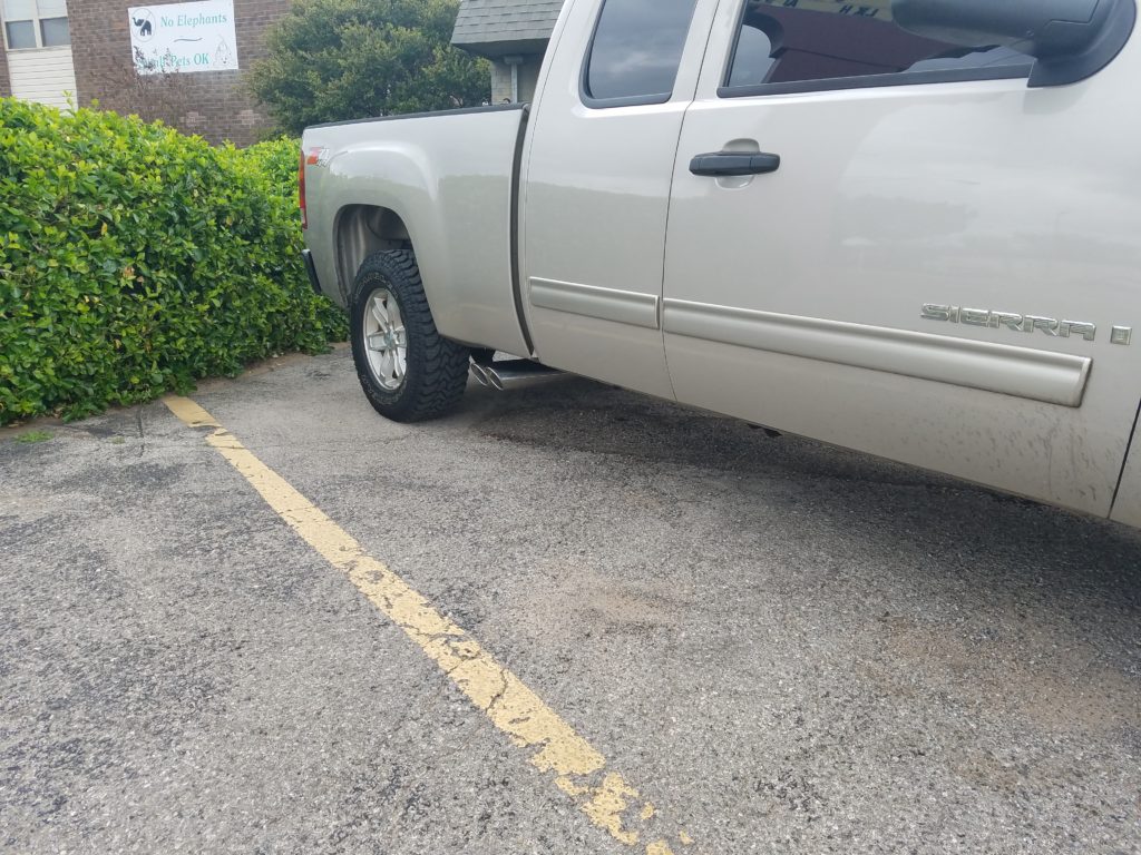 2013 Chevy Silverado that the customer requested true dual exhaust with both tailpipes and tips exiting out of the passenger side of the truck, in front of the rear tire. We call these "shotgun" tailpipes.